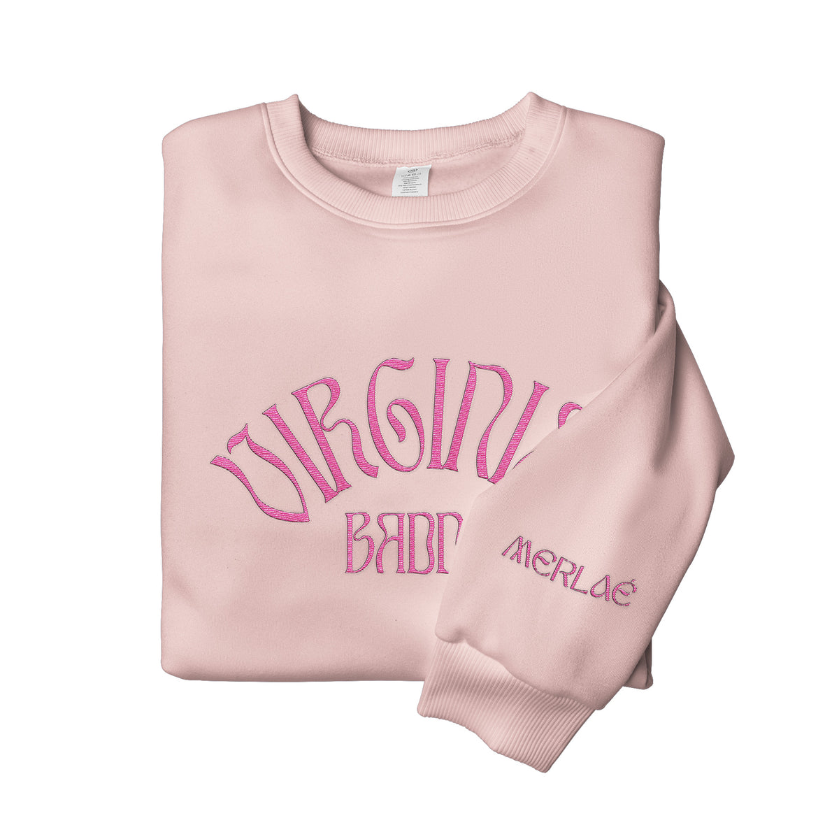 A folded light pink crewneck sweatshirt with 'VIRGINIA BADDIE' and 'MERLAE' printed in pink gothic-style lettering on the front and sleeve, shown on a plain white background.